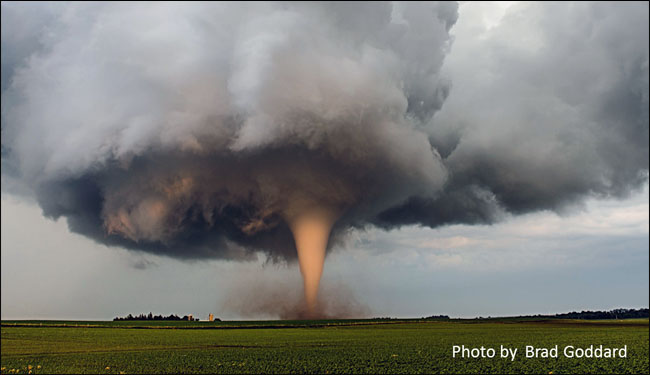 tornado is a violently rotating column of air extending from the base of a thunderstorm down to the ground. Tornadoes are capable of completely destroying well-made structures, uprooting trees, and hurling